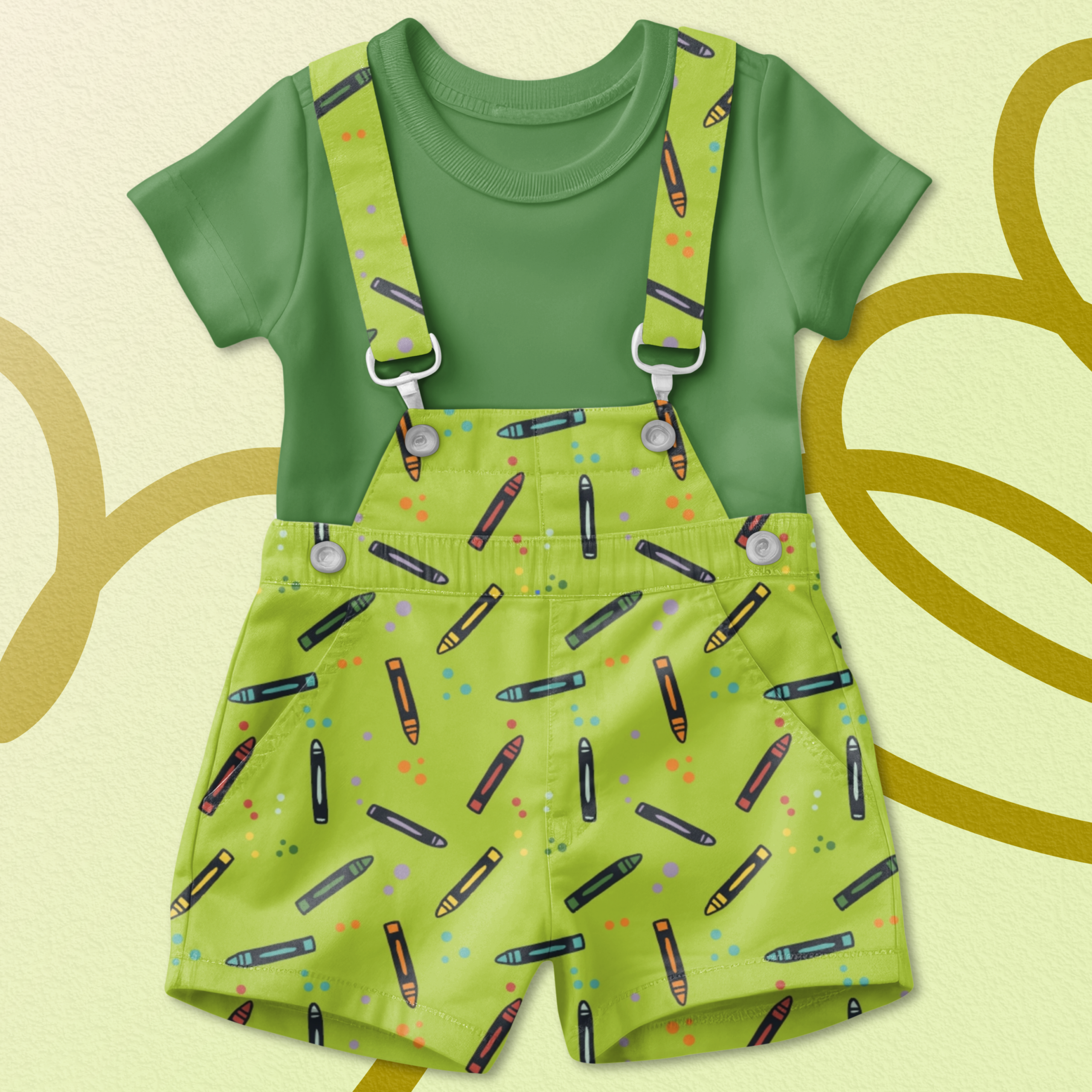 Kids clothing mockup featuring a playful crayon pattern on green overalls, ideal for children’s apparel and back-to-school surface design