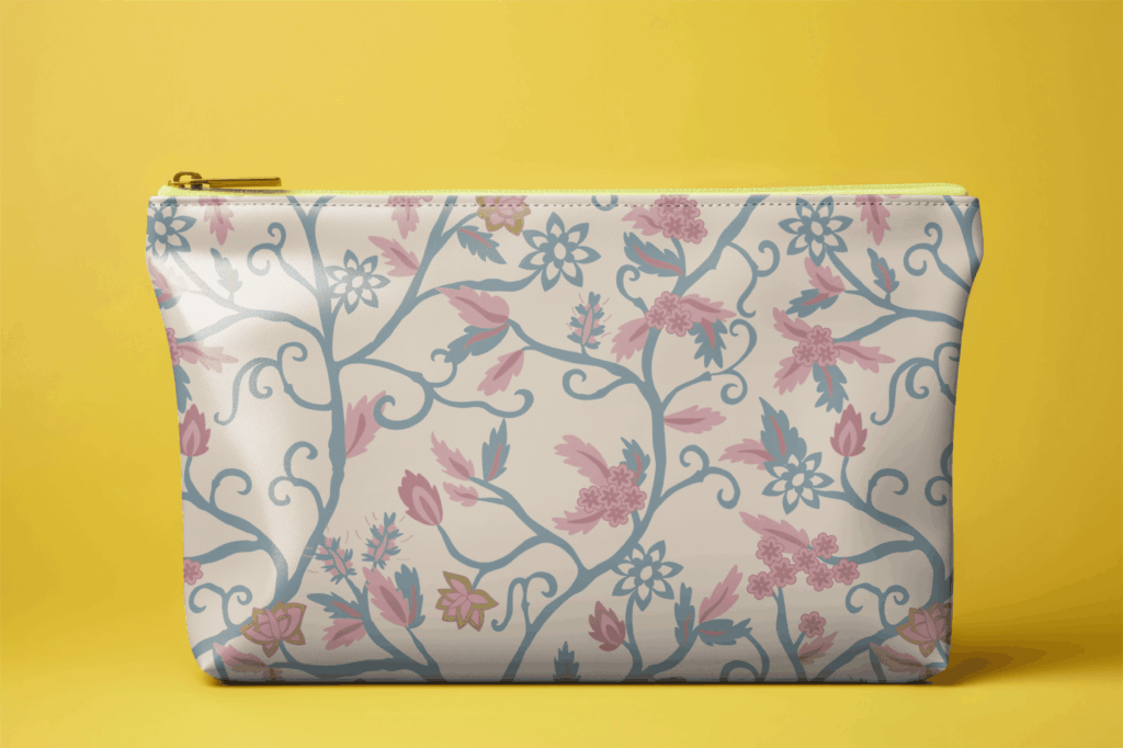 Patterned zip clutch with in front of a yellow background