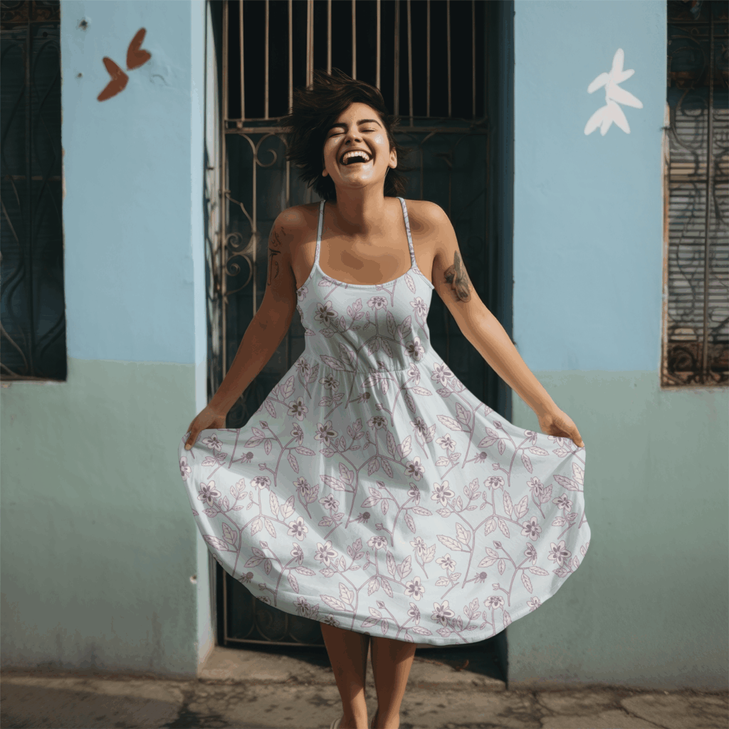 Woman twirling in light patterned dress