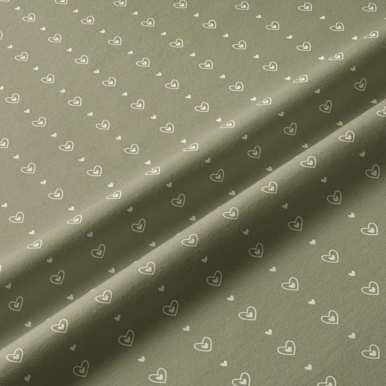 Green fabric with small repeating motif