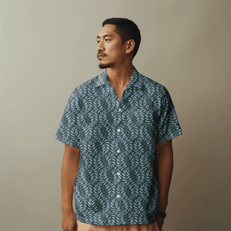 Man wearing blue patterned short sleeve shirt